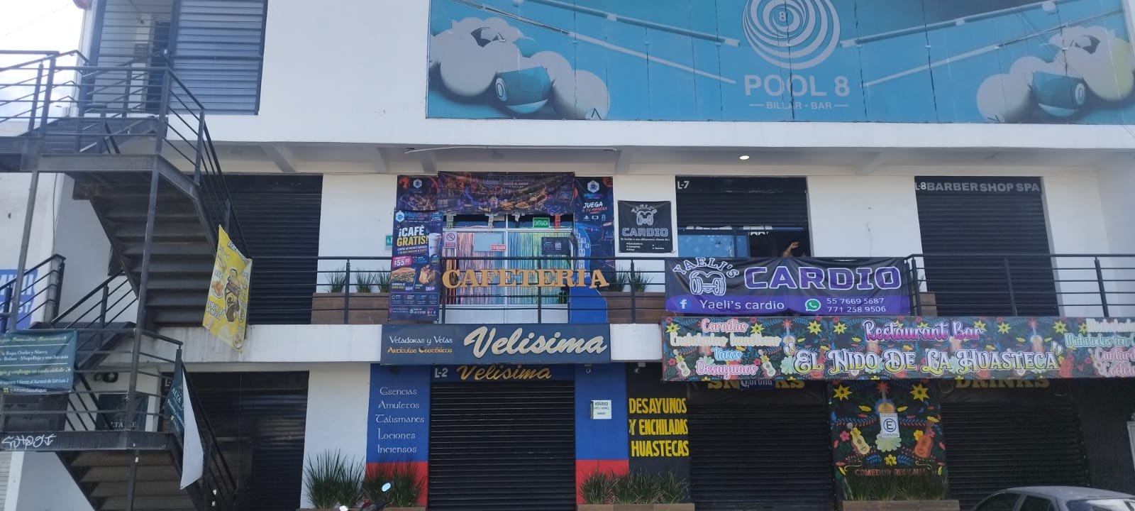 Fachada de MichiSue Café & Geek en Mineral de la Reforma — Plaza del Roble, local 6
